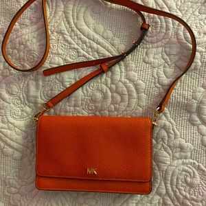 Orange phone crossbody Michael Kors purse